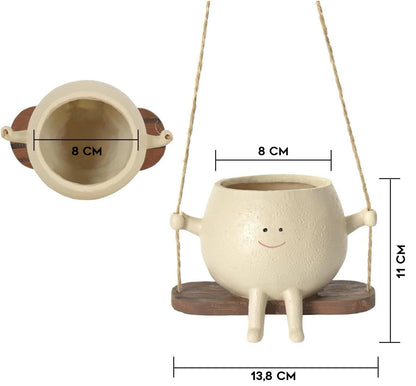 Plantepotte på gynge